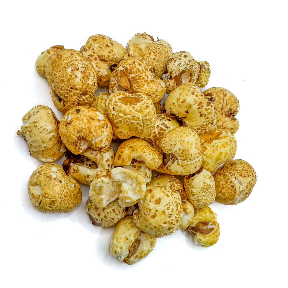 
                  
                    Pile of Honey coated puffed corn on a white background
                  
                
