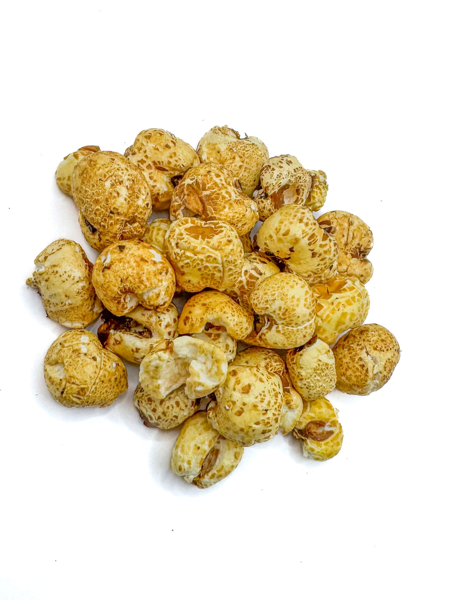 
                  
                    Pile of Honey coated puffed corn on a white background
                  
                