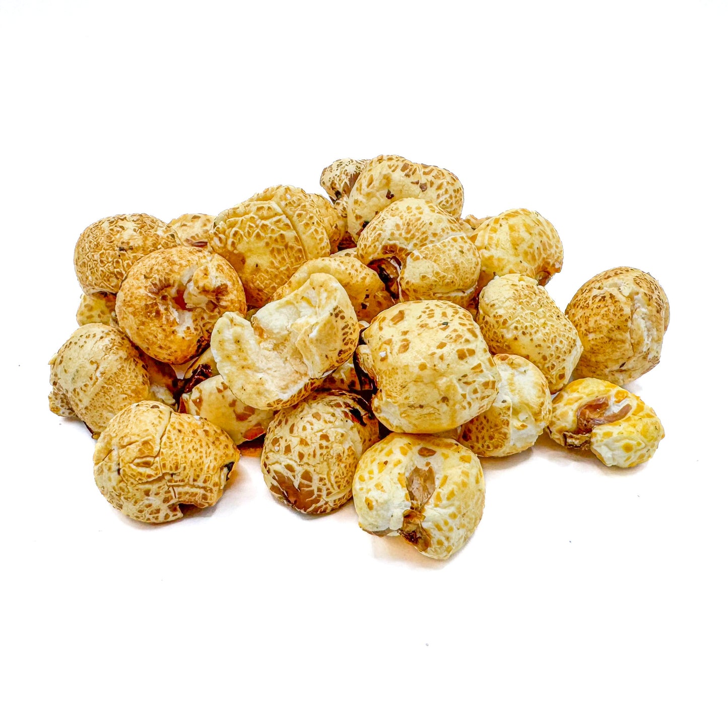 Pile of Honey coated puffed corn on a white background